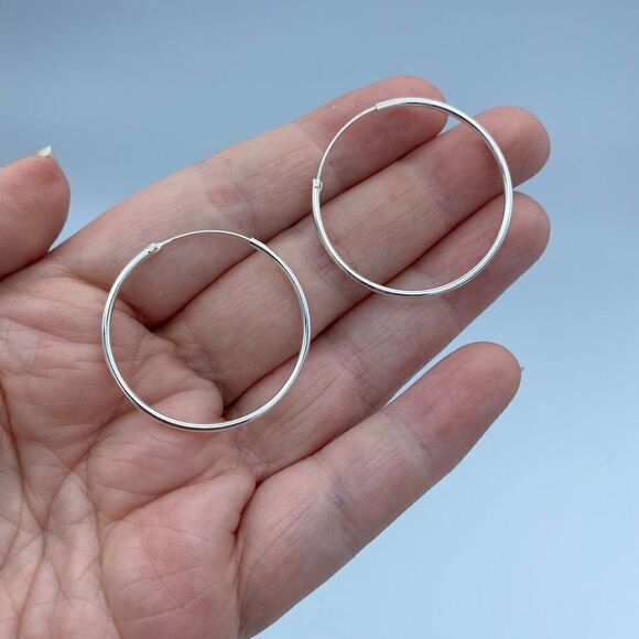 Vintage 80's Endless Hoop Sterling Silver Earrings - Picture 1 of 6